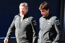 Mercedes bosses Ross Brawn and Toto Wolff walk through the paddock
