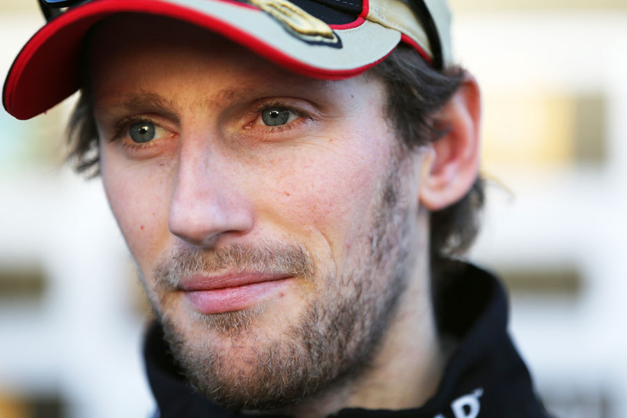 Romain Grosjean talks to the press