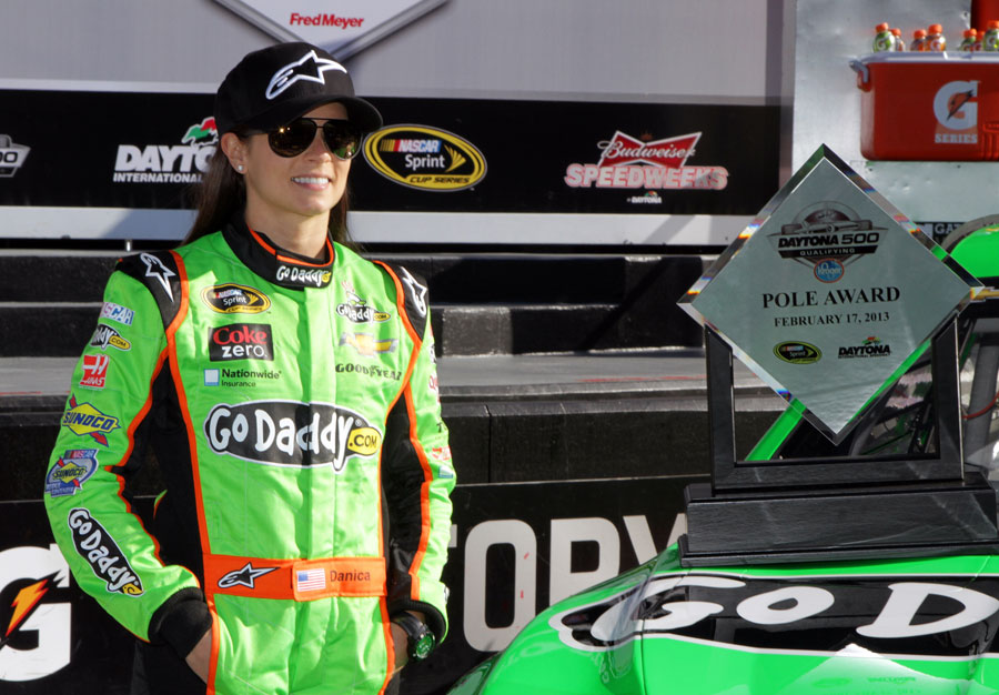 Danica Patrick poses after securing pole at the NASCAR Sprint Cup Series Daytona 500