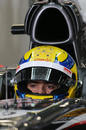 Esteban Gutierrez waits in the cockpit of the Sauber C32