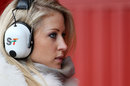 Adrian Sutil's girlfriend watches on from the Force India garage