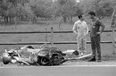 Jackie Oliver reflects on how he managed to survive a 140mph crash as he stands next to the mangled remains of his Lotus