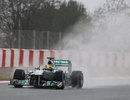 Lewis Hamilton uses full wet tyres to combat the conditions
