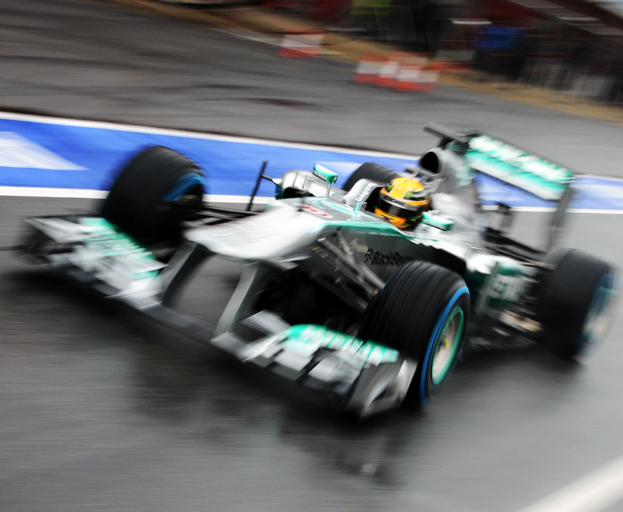 Lewis Hamilton heads out of the pits on wet tyres