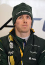 Charles Pic waits patiently in the Caterham garage