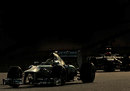 Nico Rosberg leads Kimi Raikkonen on track