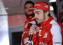Fernando Alonso talks to the press at a media day