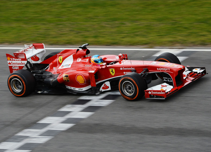 Fernando Alonso's crosses the finish line during testing