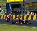 Mark Webber and Casey Stoner on track at Sydney Motorsport Park