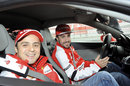 Fernando Alonso and Felipe Massa in a Ferrari 458 at a media day