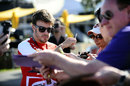 Fernando Alonso signs autographs for fans
