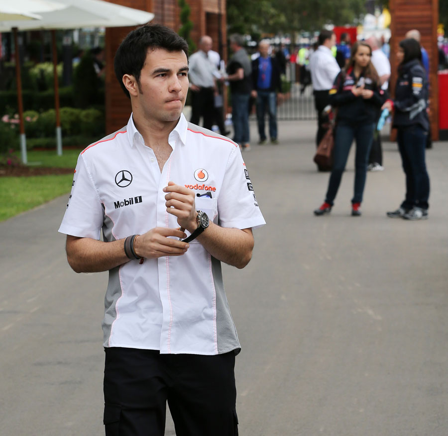Sergio Perez arrives in the paddock