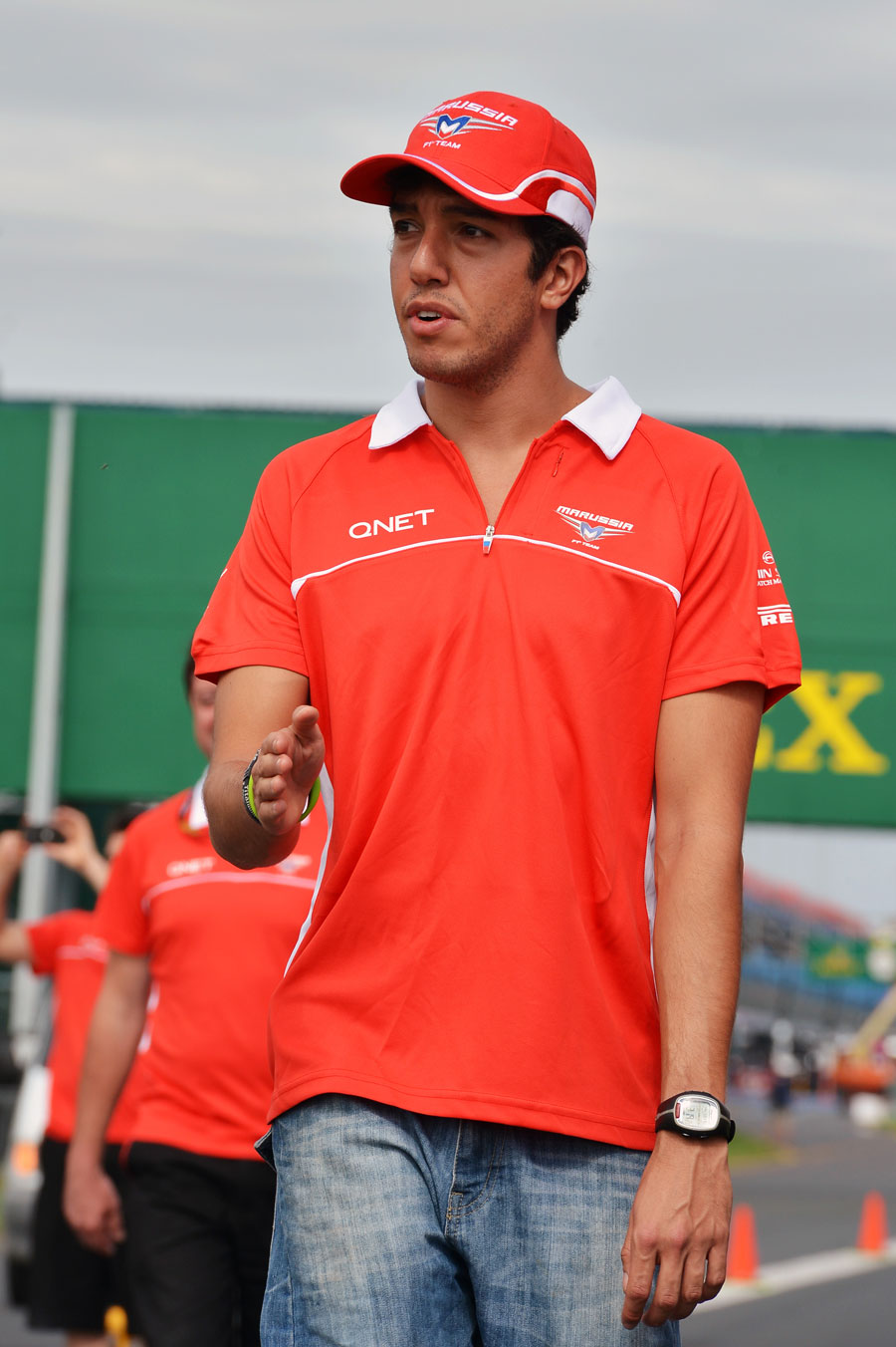 Marussia reserve driver Rodolfo Gonzalez walks the track