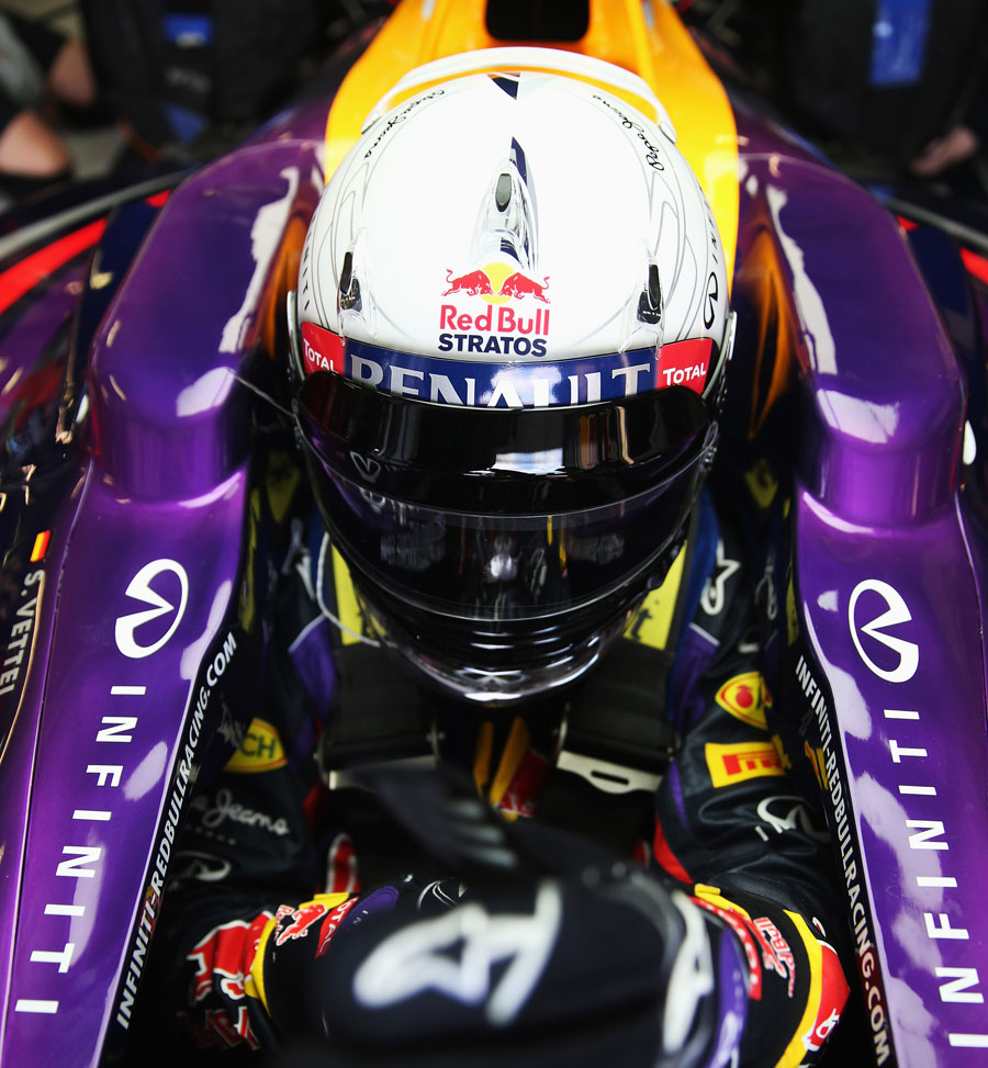 Sebastian Vettel prepares to start the defence of his title