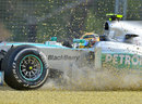 Lewis Hamilton's Mercedes ploughs through the gravel