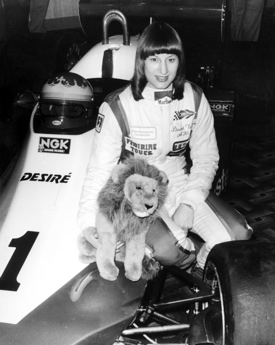 Desire Wilson with her new car, a Melchester Tyrell 008, and mascot