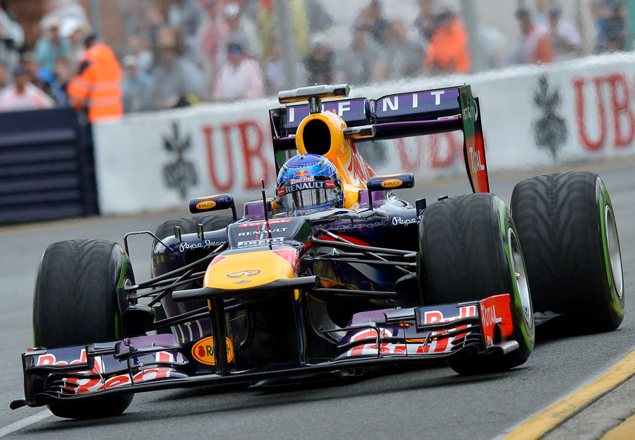 Sebastian Vettel returns to the pits on intermediates