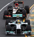 Lewis Hamilton holds off  Kimi Raikkonen