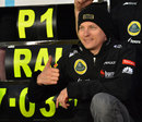 Kimi Raikkonen celebrates his victory with his team