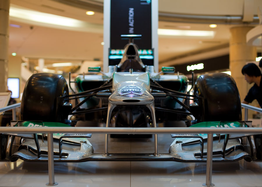 A Mercedes W03 on display in the shopping mall underneath the Petronas Twin Towers