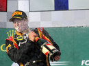 Kimi Raikkonen celebrates his victory in typical style