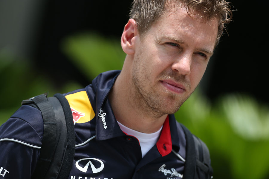 Sebastian Vettel arrives in the paddock 