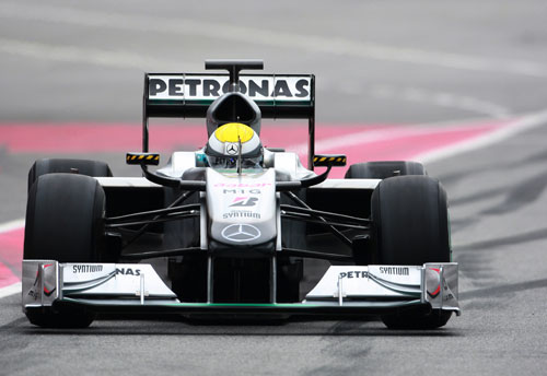 Nico Rosberg heading down the pit lane