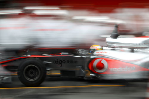 Lewis Hamilton pits in the McLaren