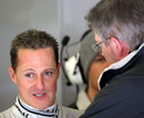 Michael Schumacher talks with Ross Brawn