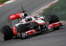 Jenson Button on track in the McLaren MP4-25