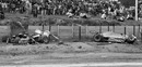 The remains of the Shadow DN8 of Tom Pryce sit in the catch fencing