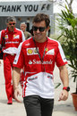 Fernando Alonso is all smiles in the Sepang paddock