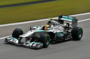 Lewis Hamilton approaches the final corner on intermediate tyres