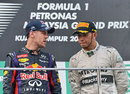 Sebastian Vettel talks to Lewis Hamilton on the podium