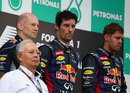 Adrian Newey, Mark Webber and Sebastian Vettel share an uneasy podium