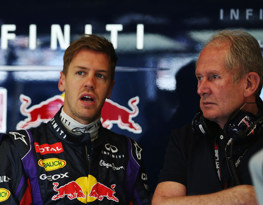 Sebastian Vettel and Mark Webber in the Red Bull garage