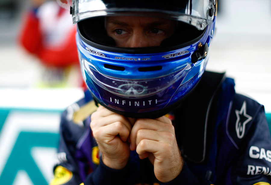 Sebastian Vettel prepares on the grid