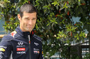 Mark Webber walks through the paddock with a new haircut