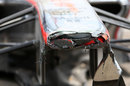 The damaged nose of Sergio Perez's McLaren