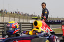 Mark Webber stands by his Red Bull after stopping due to a lack of fuel in Q2