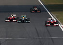 Lewis Hamilton attempts to keep Felipe Massa at bay after being passed by Fernando Alonso