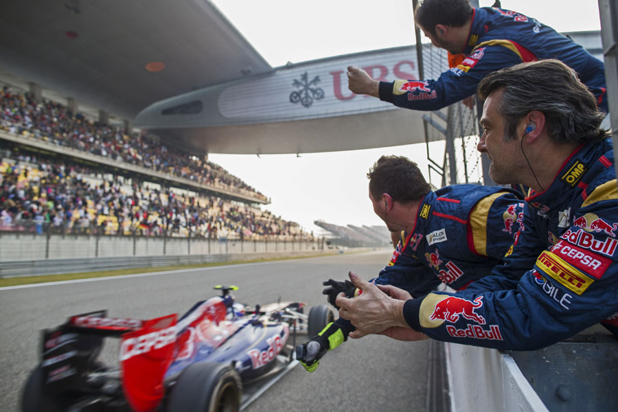 Toro Rosso celebrates as Daniel Ricciardo brings the car home in seventh