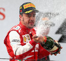 Fernando Alonso celebrates  after winning in China