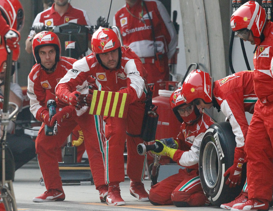 Ferrari mechanics a picture of concentration