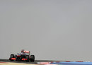 Jenson Button attacks the track on medium tyres