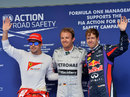 Nico Rosberg celebrates taking pole position alongside Fernando Alonso and Sebastian Vettel