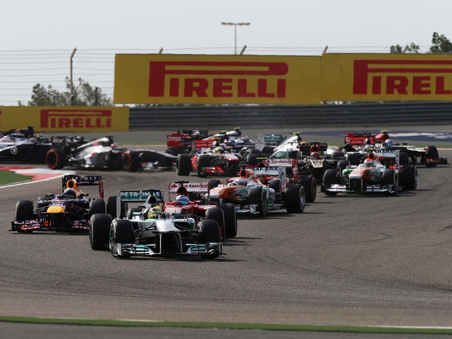 Nico Rosberg leads the field into turn two