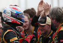 Romain Grosjean celebrates with his engineers