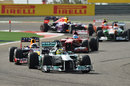 Nico Rosberg leads the field into turn two