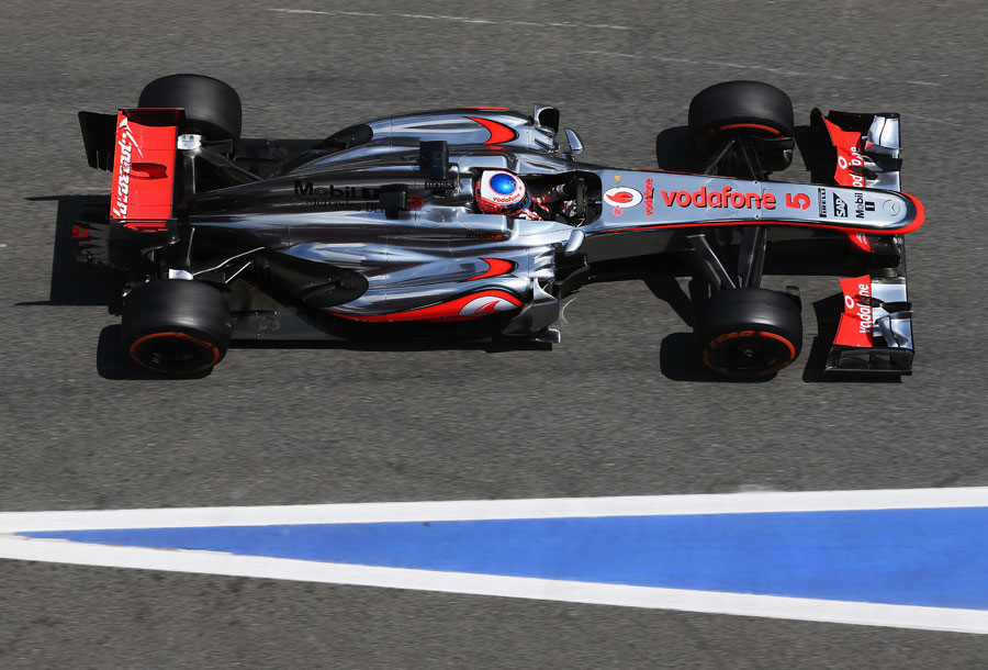 Jenson Button leaves the pits